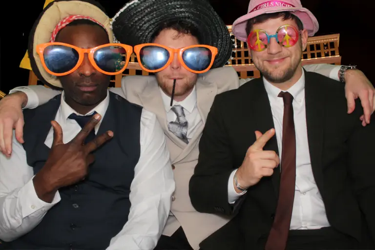 Three-men-posing-together-in-a-magicpix-photo-booth